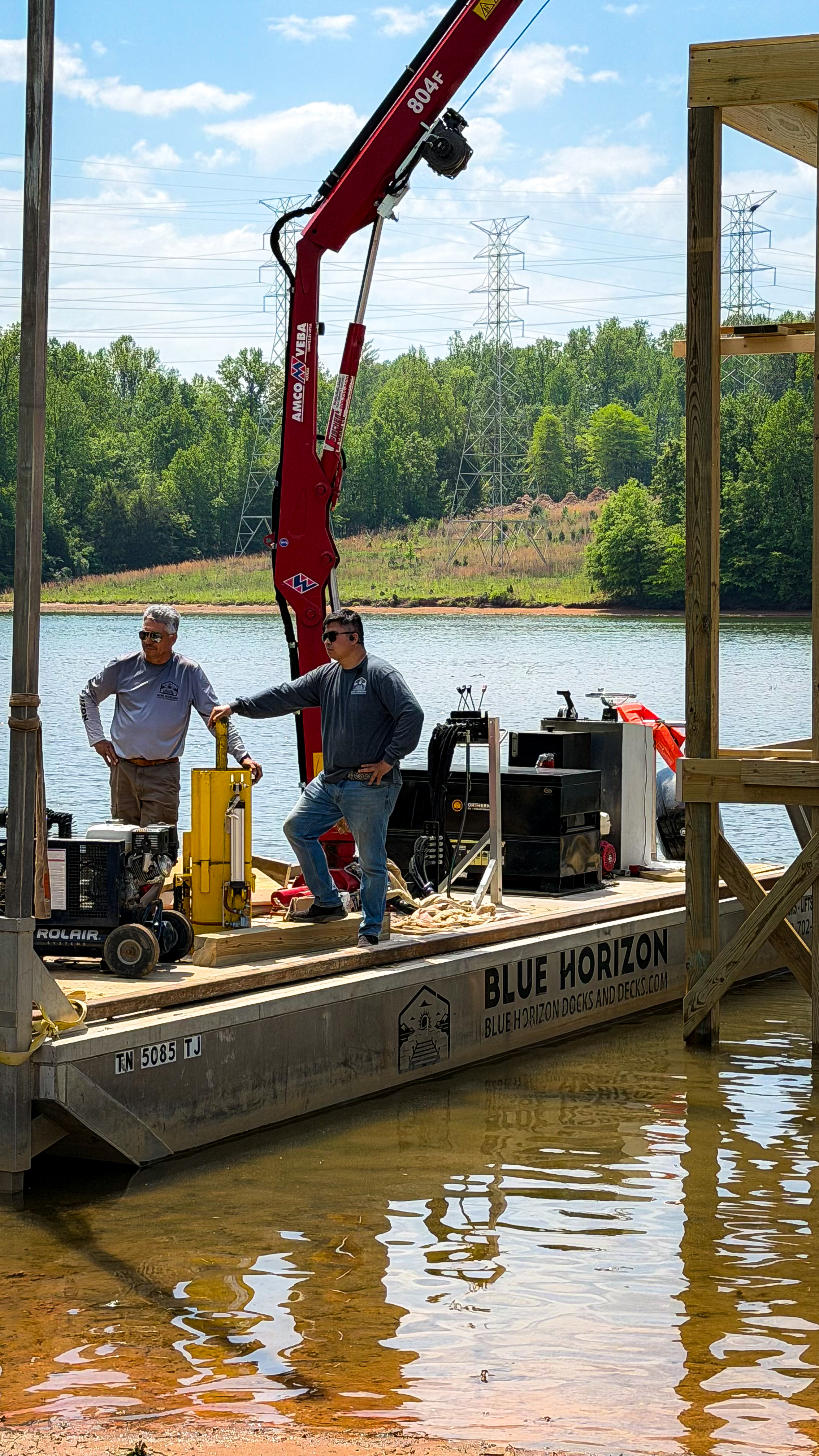 Blue Horizon crew on the work barge with lift hardware