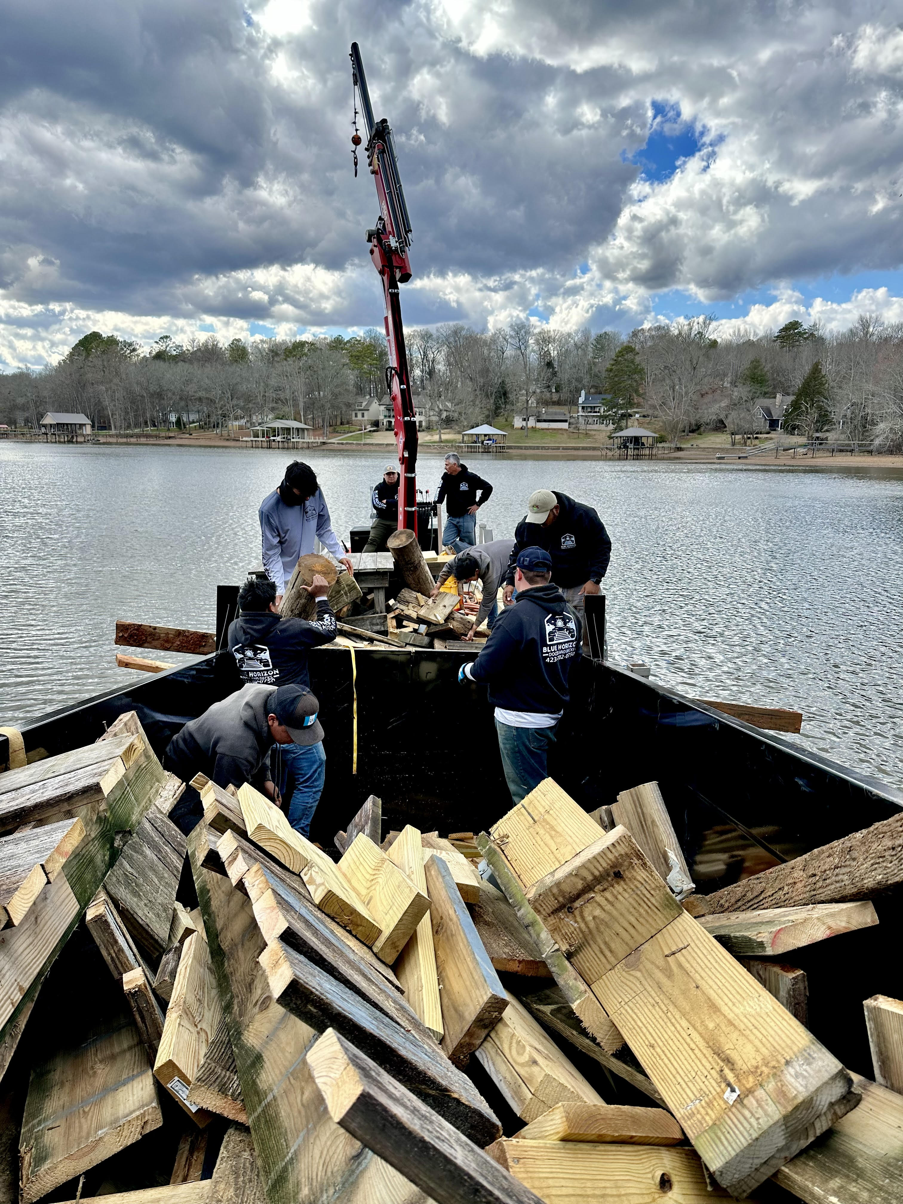 Blue Horizon crew on the work barge handling TVA 26a permits and dock construction